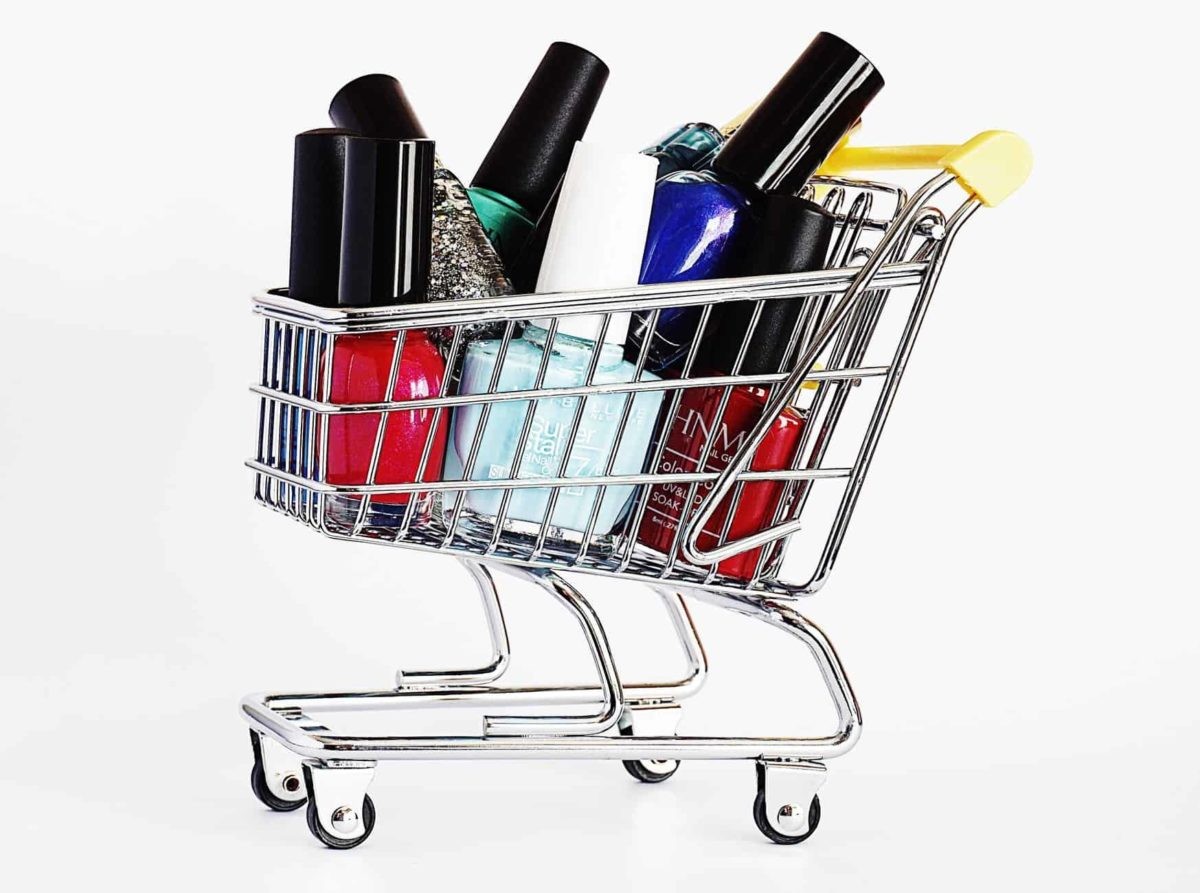 stainless steel mini shopping cart with nail polish bottles